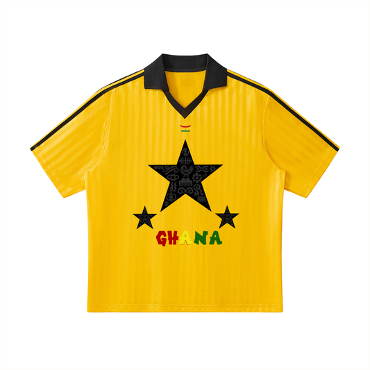 Yellow sports jersey with black star and 'Ghana' text on a white background